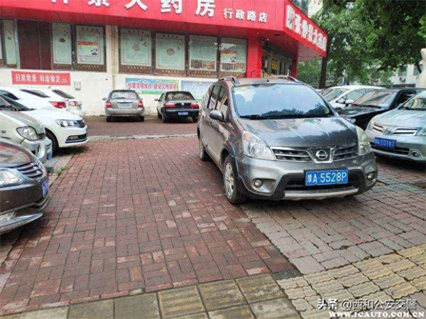 车子乱停打什么电话拖车(乱停车打122还是110)